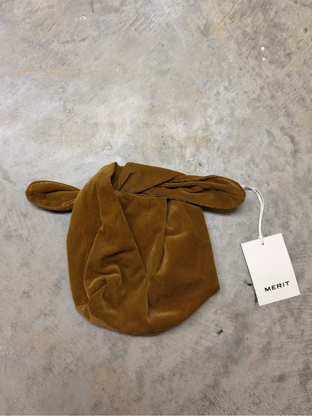 MERIT Corduroy Knot Cosmetic Pouch in Mustard Brown